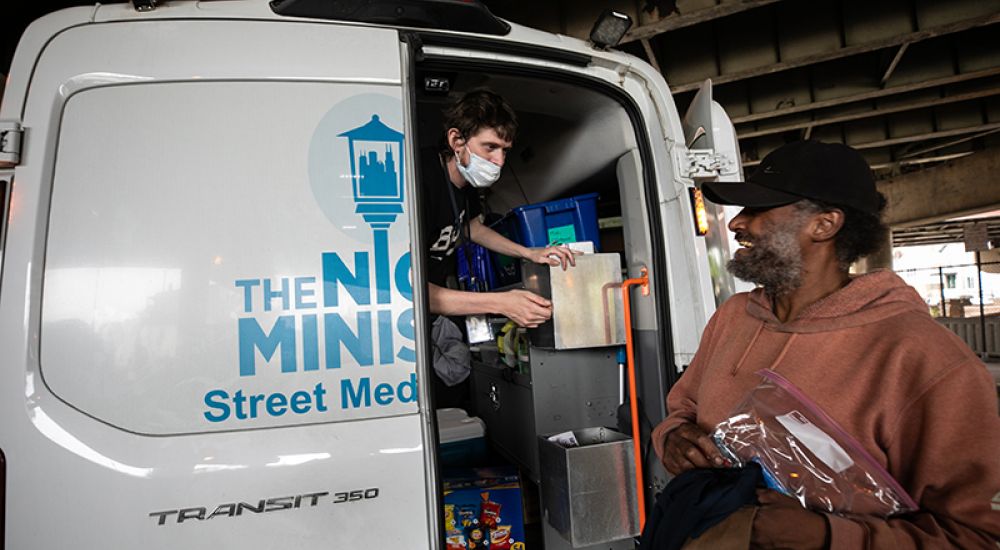 The Night Ministry volunteers sorting hygiene products for the agency's clients